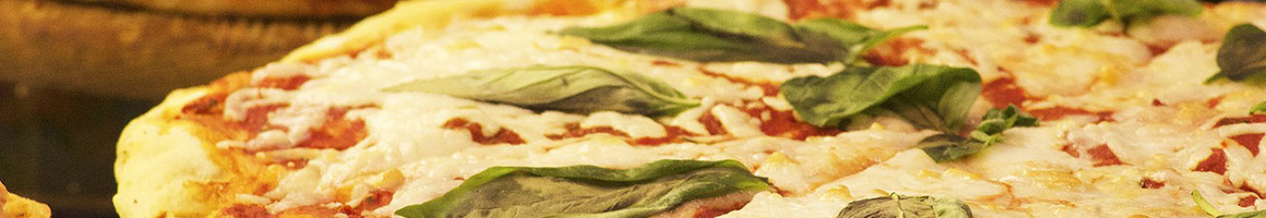 Eating Italian Pizza at Venice Pizza & Pasta restaurant in Newark, TX.
